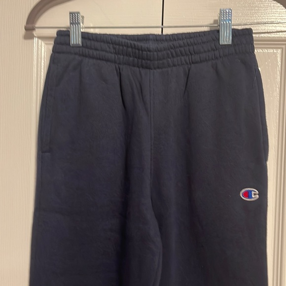 Champion sweat pants with cuffed bottom in navy blue size kids medium - Picture 2 of 6